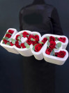 Композиция в каркасе LOVE с розами