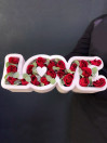 Композиция в каркасе LOVE с розами